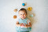 Tikiri Toys Cookie Natural Rubber Teether, Rattle & Pretend Play
