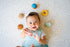Tikiri Toys Cookie Natural Rubber Teether, Rattle & Pretend Play